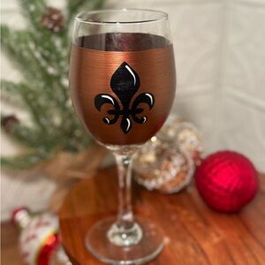 Bronze hand painted fleur de lis wine glass.
